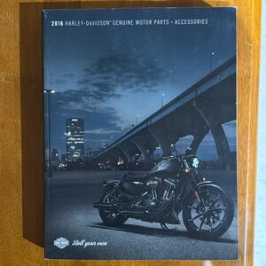 Two Harley-Davidson motor parts and accessories books